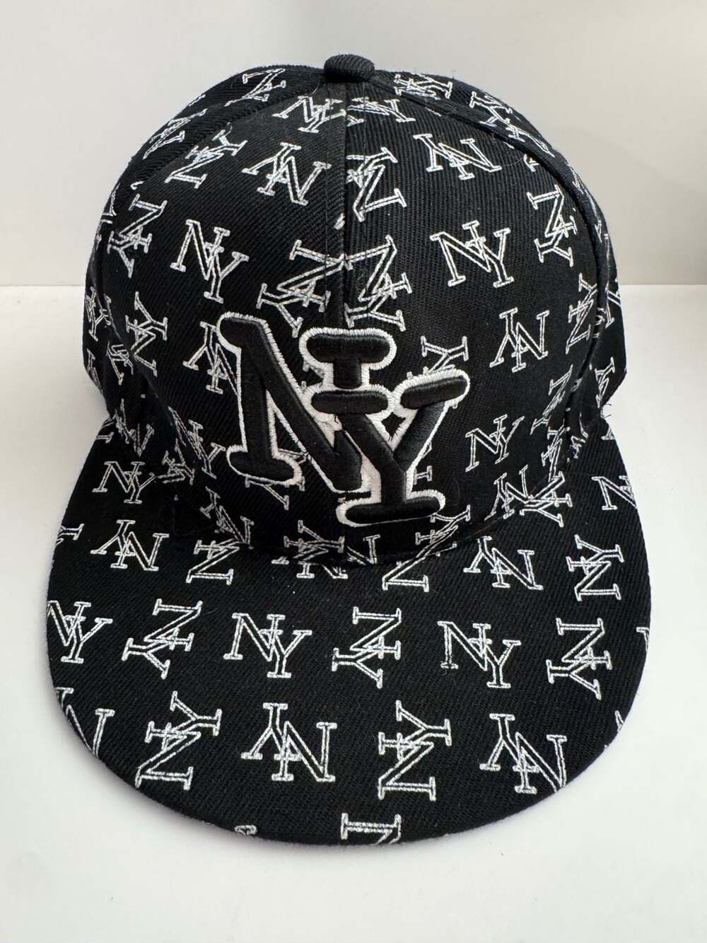 New York NY All-Over Print Black and White Flat Bill Fitted Hat